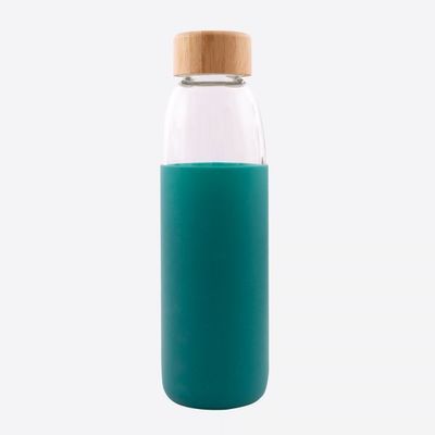 Bouteille en verre avec manchon en silicone vert pétrole 580ml  Point-Virgule