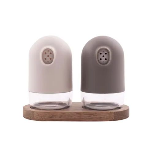 Set de salière et poivrière taupe/gris avec support  Point-Virgule