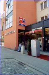 Zijaanzicht winkel
richting Tienen.